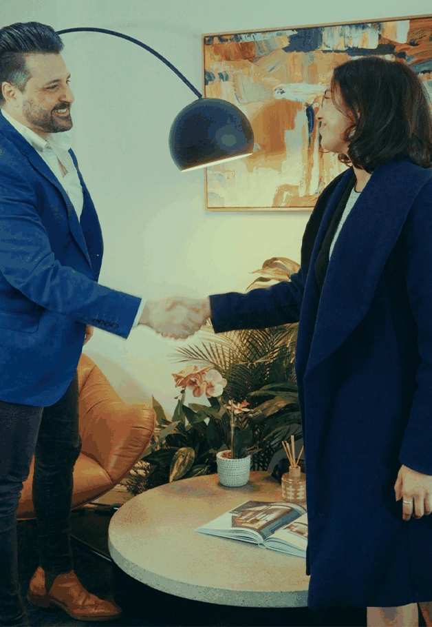 A Float advisor shaking hands with a client